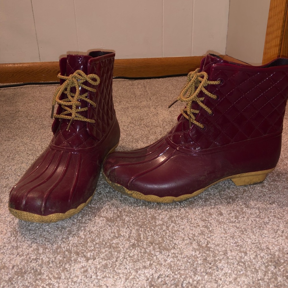 Burgundy rain boots wore once